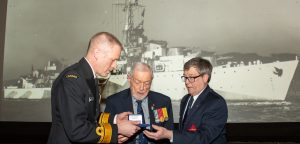 Cdr (ret'd) Tim Addison and RAdm Donovan present Admirals' Medal to Mr. Peter Ward.